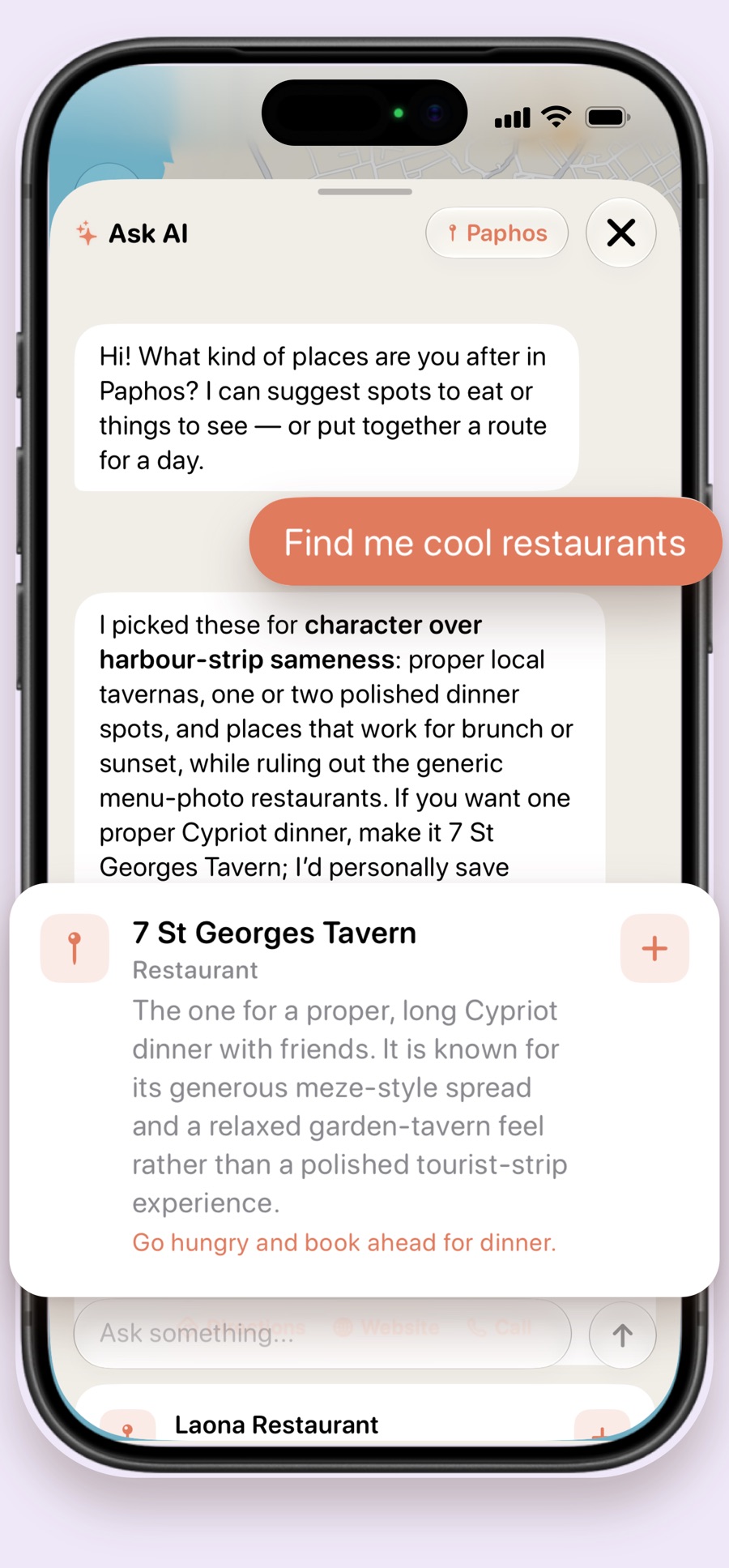 Travelino AI chat: asked for cool restaurants in Paphos, it recommends 7 St Georges Tavern with a short review